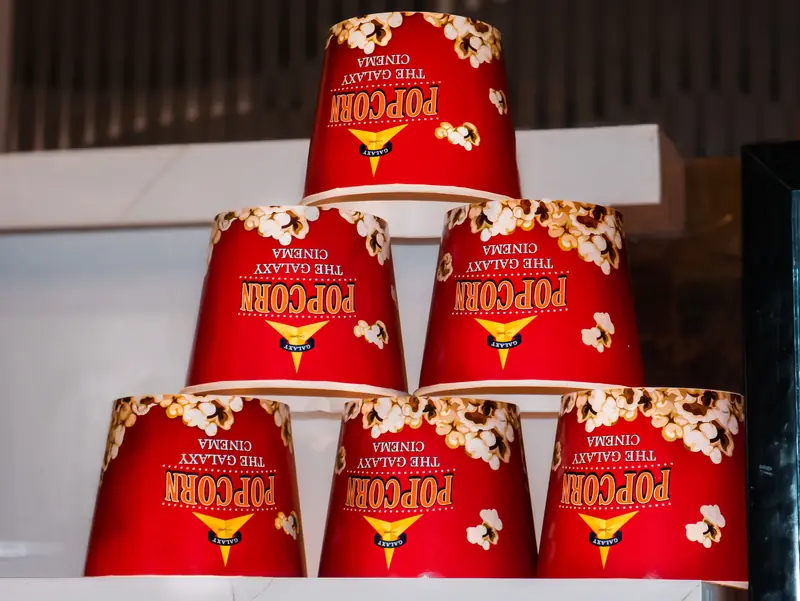 Stacked Galaxy Cinema popcorn tubs